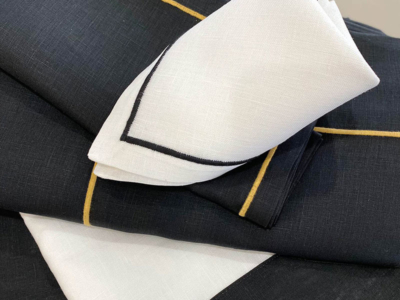 Mantelería 100% lino europeo con festón bordado